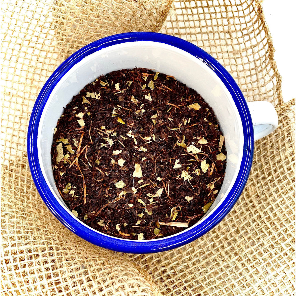 Real Aussie Campfire Tea, Australian Made with Australian Ingredients. Here the tea leaves are presented in a traditional Campfire Cup to show the Lemon Myrtle and Eucalyptus leaves within.