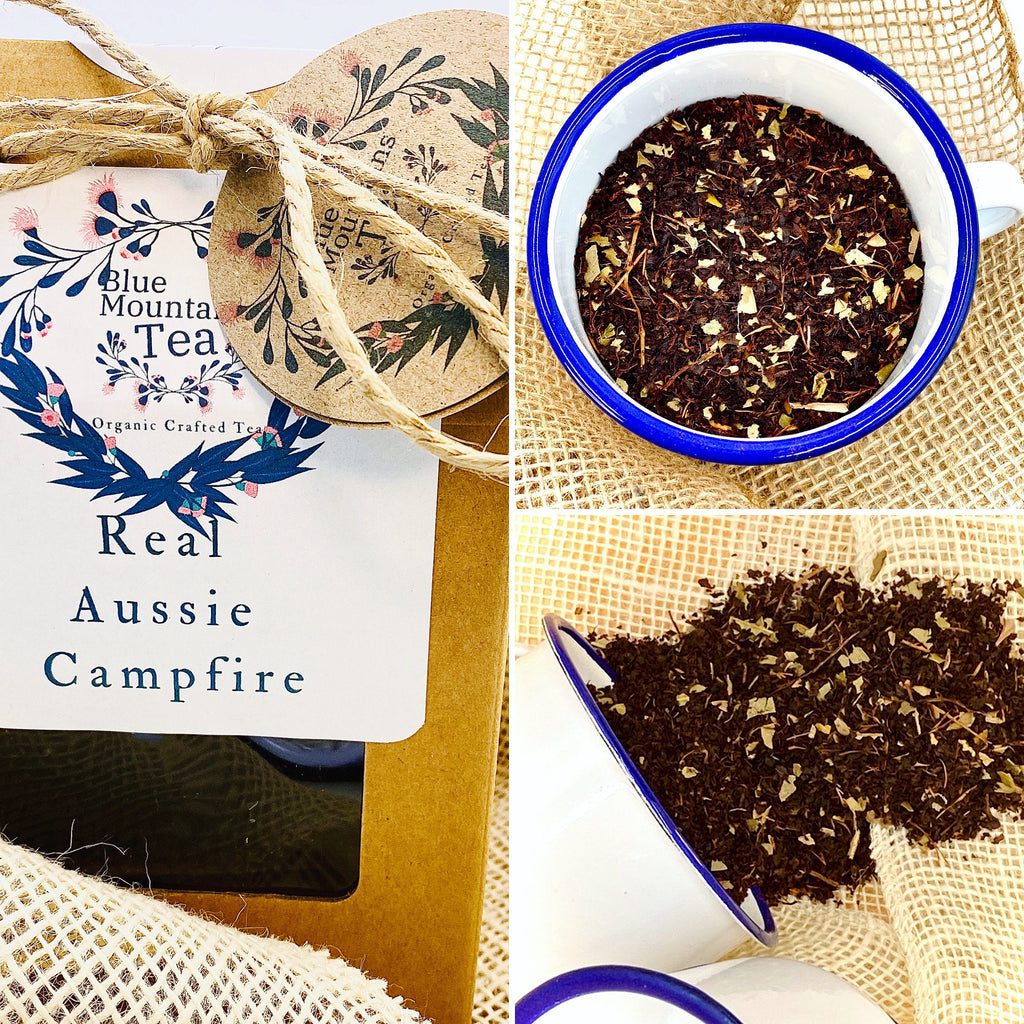 Real Aussie Campfire Tea, Australian Made with Australian Ingredients. Here the tea leaves are scattered to show the Lemon Myrtle and Eucalyptus leaves within. With view of Tea Leaves in a traditional Campfire cup.
